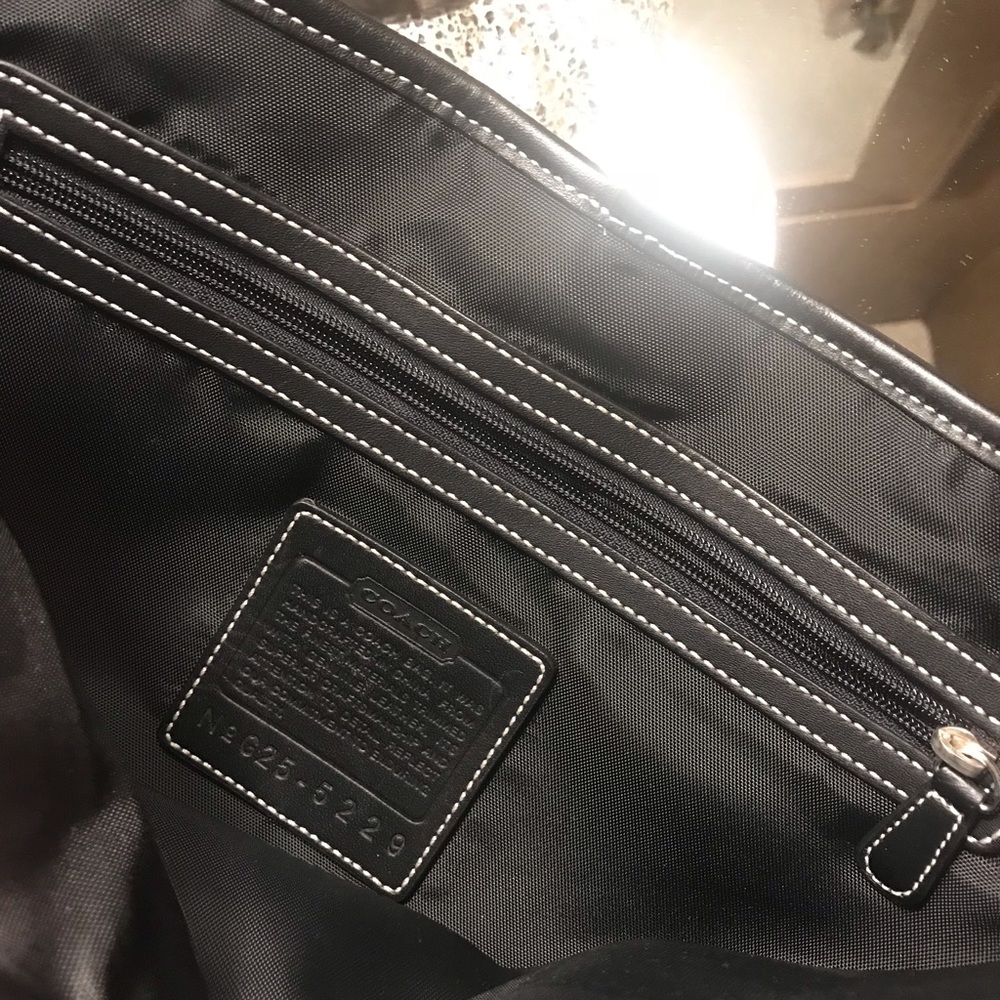 Coach messenger reserved